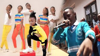 Triplets and Felista join Ring rapper as he gets a bursary. Thanks to Namungoona High School