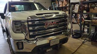 GMC truck with amber Feniex lighting