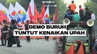 AKSI BURUH TUNTUT KENAIKAN UPAH MINIMUM