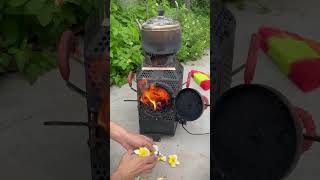 burning flowers ok? #woodstove #outdoorstove #cookingstove #bbq #outdoorcooking