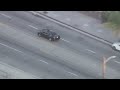 Suspects run out of vehicle during LA pursuit