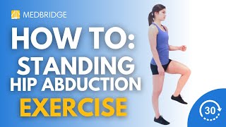 How to Do a Standing Isometric Hip Abduction with Knee at Wall Exercise | 30 Seconds | MedBridge