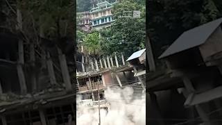 Landslide tears through buildings in India