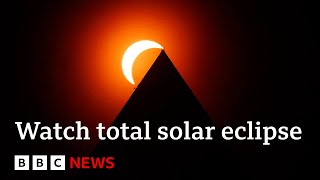 Total solar eclipse brings darkness to millions as it sweeps North America | BBC News