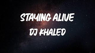 DJ Khaled - STAYING ALIVE (feat. Drake & Lil Baby) [Lyric Video]