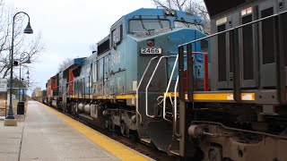 IC 2466 (Blue Devil) trails on CN Q199 at Prairie Crossing