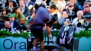 Novak Djokovic smashes Perrier sign at 2012 French Open