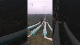 Watch how electrical workers walk on high altitude power lines #process #workers #electricalwork