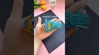 What are you doing at home during the summer vacation? Use colored paper to make a small fish