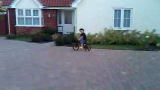 Aidan riding on two wheels for the first time!