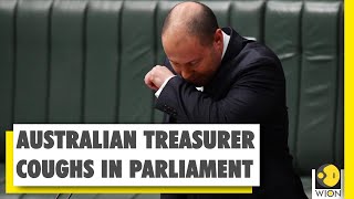 Australian treasurer suffers severe cough in parliament, moves to isolation after incident