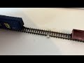 z scale uncoupling with micro trains magnematic couplers using neodymium magnets glued on track.