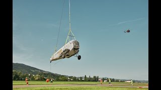 „Umzug JU52 im Hubschrauber-Schlepptau über den Bodensee“