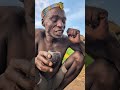 what 😲🙆‼️ that s incredible lunch very delicious food enjoying hadza woman eating meal culture