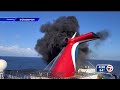 Carnival Cruise ship catches fire while docked in Grand Turk