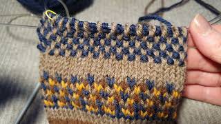 1.1Main stitch, 1 row. Mittens-gloves with a flap, with needles. Knitting.