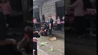 Chinese Urban Para-cops Beat a Village Woman 中国城管猛揍农妇