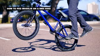 How to Peg Wheelie on a Bmx Bike by a Professional Rider