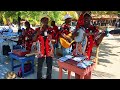 a haitian band performs for cruise ship tourists at labadee