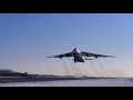 an 124 100 s take off and low pass.