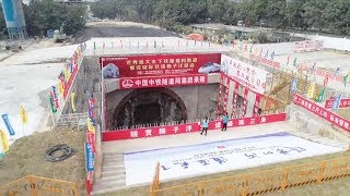 World's widest railway tunnel holed through in S. China