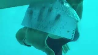 Video: Man seen in underwater-style marriage proposal