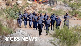 Rescuers pull survivors and bodies from abandoned South Africa gold mine