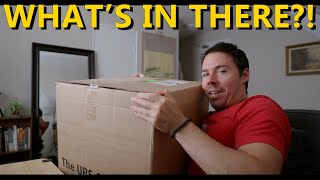 Unboxing A Mystery Package: Cameras AND Lenses?!