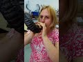 Jenna blowing a Jacob sheep Shofar in the factory