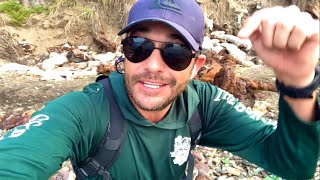 Digging Through Piles of Glass Barehanded at One of the Best Sea Glass Beaches in the Caribbean