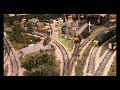 Class 44 hooks up and pulls a crane out of an engine shed : 4K Widescreen.