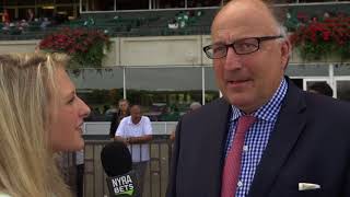 Maggie Wolfendale talks with Christophe Clement after the 2017 Belmont Turf Sprint Invitational