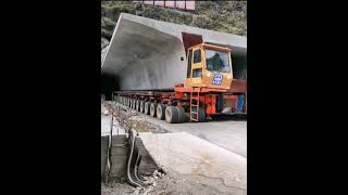 Mini truck transporting concrete girder bridge