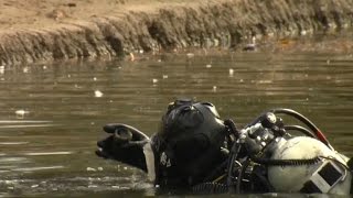 Divers Pull Objects From Lake In San Bernardino Investigation