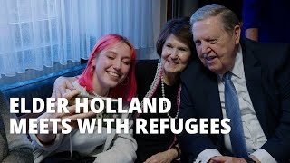 Refugees Meet with Elder and Sister Holland in Germany