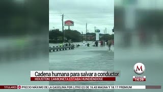 Hacen cadena humana para salvar a conductor en Houston