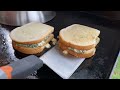 spanakopita grilled cheese made on the blackstone griddle