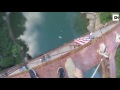 daredevil jumps off 105ft bridge