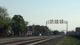 Metra 112 leads a double header thru La Vergne