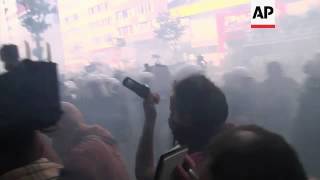 May Day demonstrators and police clash