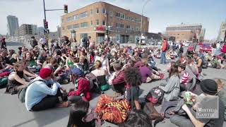 RAW: Protester stage short sit-in