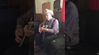 David Harnett singing "only a dude dressed up  in all these cowboy clothes