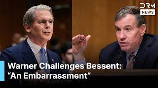 “An Embarrassment”, Mark Warner Challenges Bessent Over Trump’s DNI Pick in Heated Hearing | AC1G