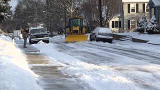 Snow Plowing with a 655E New Holland Backhoe