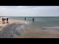 traditional two person beach seine net fishing in sri lanka