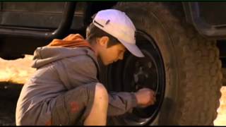 Kid deflates a tire