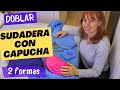 Doblar SUDADERAS con CAPUCHA para ahorrar espacio