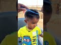 innocent baby getting perfect haircut