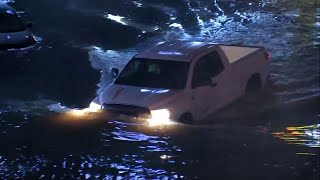 Heavy rain floods Houston streets