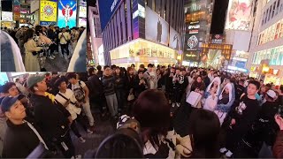 A Z-cup cow walks through Dotonbori Halloween 2023